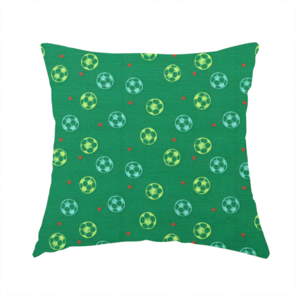 The fabric used to create this handmade cushion is a  rich emerald green fabric featuring a playful, repeating soccer and stars pattern.