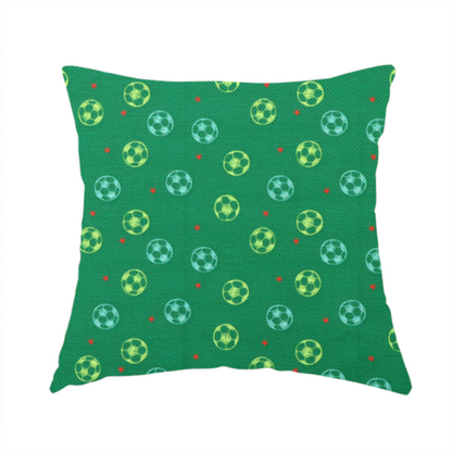 The fabric used to create this handmade cushion is a  rich emerald green fabric featuring a playful, repeating soccer and stars pattern.