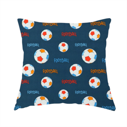 The fabric used to create this handmade cushion is a deep navy blue fabric featuring a lively, repeating soccer-themed pattern.