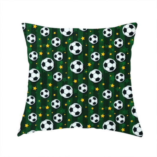 The fabric used to create this handmade cushion is a rich forest green fabric featuring a classic, high-energy soccer and stars pattern.