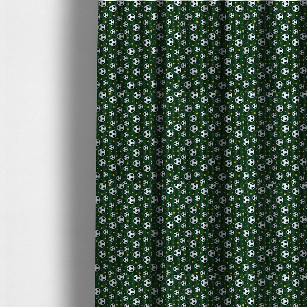 The fabric used to create these made-to-measure curtains is a rich forest green fabric featuring a classic, high-energy soccer and stars pattern.