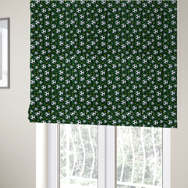 The fabric used to create these Roman blinds is a rich forest green fabric featuring a classic, high-energy soccer and stars pattern.