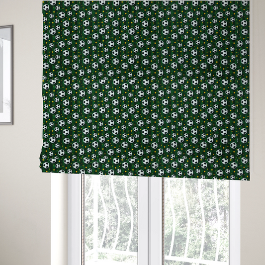 The fabric used to create these Roman blinds is a rich forest green fabric featuring a classic, high-energy soccer and stars pattern.