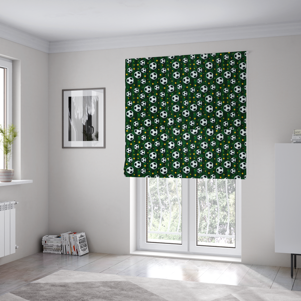 The fabric used to create these Roman blinds is a rich forest green fabric featuring a classic, high-energy soccer and stars pattern.