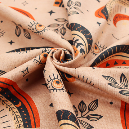 Seamless fabric pattern featuring bohemian style rainbows, mystic evil eyes, moon phases, and botanical leaves in terracotta orange, charcoal black, and tan.