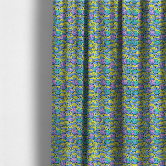 The fabric used to create these made-to-measure curtains is a seamless novelty fabric pattern featuring a dense, overlapping collage of cartoon emoji smiley faces wearing blue face masks in bright neon yellow, green, and pink.