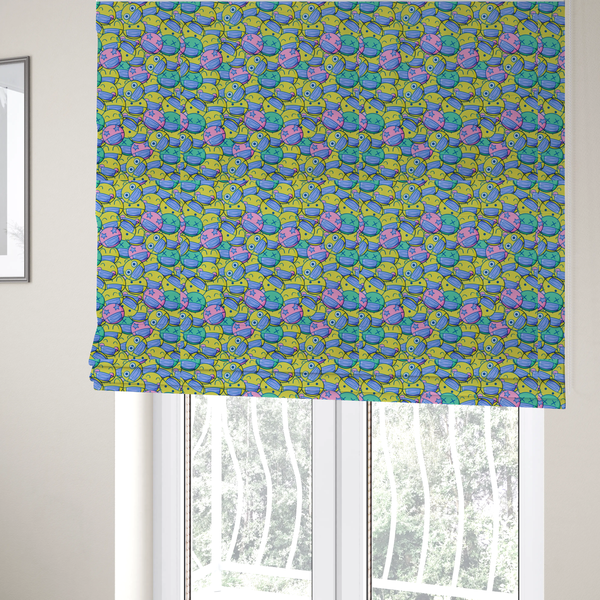 The fabric sued to create these Roman blinds is a seamless novelty fabric pattern featuring a dense, overlapping collage of cartoon emoji smiley faces wearing blue face masks in bright neon yellow, green, and pink.