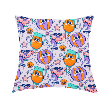 The fabric used to create this handmade cushion is a seamless lavender fabric pattern featuring retro 1930s cartoon beach motifs, including a watermelon slice taking a selfie, a smiling juice pitcher, beach balls, and seashells.