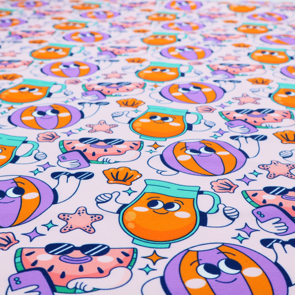 Seamless lavender fabric pattern featuring retro 1930s cartoon beach motifs, including a watermelon slice taking a selfie, a smiling juice pitcher, beach balls, and seashells.
