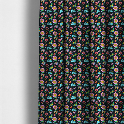 The fabric used to create these made-to-measure curtains is a seamless black fabric pattern featuring a colourful psychedelic print of retro cartoon mushrooms, smiling flowers, happy worms, winking clouds, and rainbow arches.