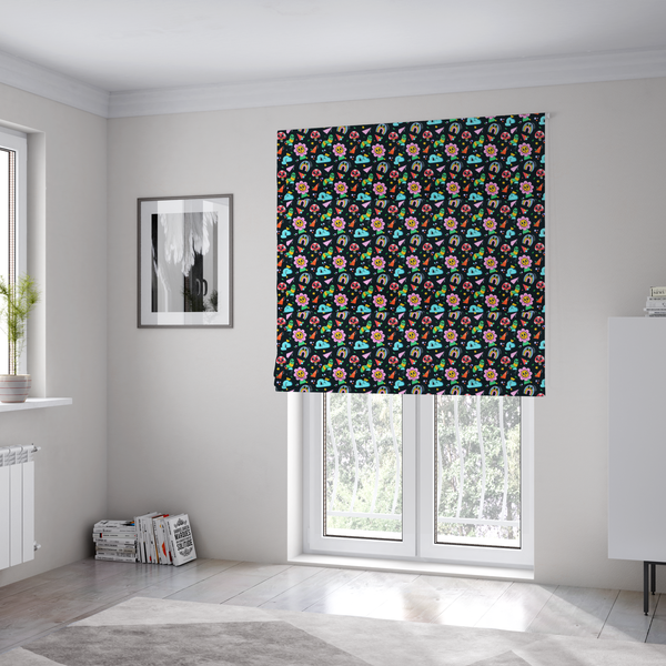 The fabric used to create these Roman blinds is a seamless black fabric pattern featuring a colourful psychedelic print of retro cartoon mushrooms, smiling flowers, happy worms, winking clouds, and rainbow arches.