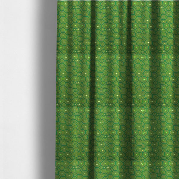 The fabric used to create these made-to-measure curtains is a seamless green fabric pattern featuring a detailed geometric print resembling a natural tortoise or sea turtle shell with concentric lines.