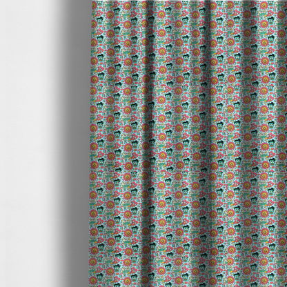 The fabric used to create these made-to-measure curtains is a seamless light blue fabric pattern featuring a busy retro cartoon collage with smiling flowers, heart characters, pompadour men, and "WOW" comic speech bubbles.