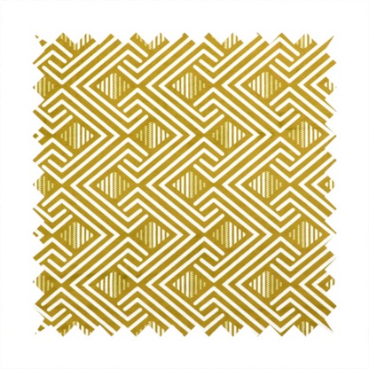A dynamic geometric pattern with a repeating labyrinth or fretwork motif. The fabric showcases a sophisticated mustard yellow and white colour palette, with crisp white interlocking lines creating diagonal chains and diamond shapes against a warm, golden-yellow background.