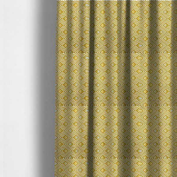 The fabric used to create these made-to-measure curtains is a dynamic geometric pattern with a repeating labyrinth or fretwork motif. The fabric showcases a sophisticated mustard yellow and white colour palette, with crisp white interlocking lines creating diagonal chains and diamond shapes against a warm, golden-yellow background.