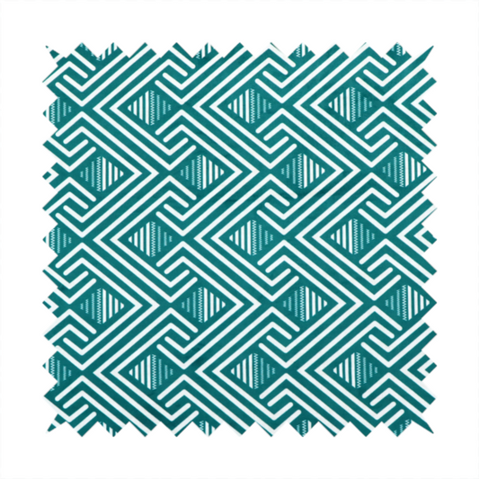 A striking geometric pattern featuring an interlocking labyrinth or fretwork motif. The fabric is set in a refreshing teal and white colour palette, with crisp white lines weaving together to form diagonal chains and diamond shapes against a rich, deep sea-green background.