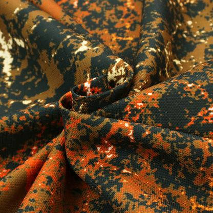 A fabric featuring a dense, distressed abstract pattern. The design mimics a weathered or "crackle" effect with a high-contrast colour palette.