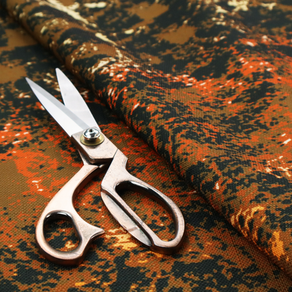 A fabric featuring a dense, distressed abstract pattern. The design mimics a weathered or "crackle" effect with a high-contrast colour palette.
