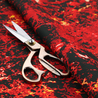 A durable upholstery fabric featuring a striking, high-contrast distressed abstract pattern. This colourway is the most intense in the collection, offering a bold and dramatic aesthetic.