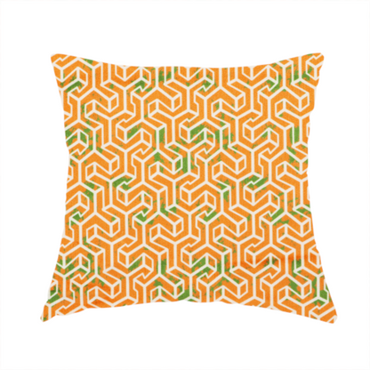 The fabric used to create this handmade cushion is a orange and white textile fabric featuring a smaller, densely repeating interlocking geometric pattern. The design consists of fine white outlines forming complex, three-dimensional isometric block structures on an orange background. Scattered green, moss-like textured speckles are integrated throughout, creating an organic, weathered look against the sharp geometry.