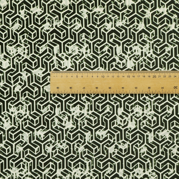 A black and off-white textile fabric featuring a small-scale, densely repeating interlocking geometric pattern. Fine off-white outlines construct complex, three-dimensional isometric block formations against a solid black background. Pale green, distressed textured speckles are integrated throughout, creating a weathered, organic contrast to the sharp geometric structure.