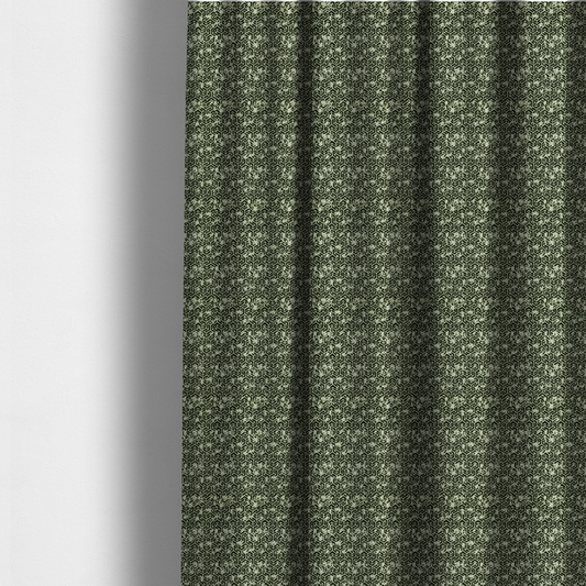 The fabric used to create these made-to-measure curtains is a black and off-white textile fabric featuring a small-scale, densely repeating interlocking geometric pattern. Fine off-white outlines construct complex, three-dimensional isometric block formations against a solid black background. Pale green, distressed textured speckles are integrated throughout, creating a weathered, organic contrast to the sharp geometric structure.