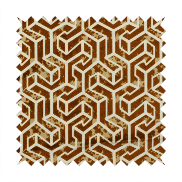 A brown and cream textile fabric featuring a repeating, interlocking geometric pattern. The design consists of cream-colored outlines forming three-dimensional, isometric maze-like structures against a warm, dark brown background. Lightly distressed, tan-speckled textures are subtly scattered throughout the brown spaces, adding a weathered, organic feel to the structured, geometric design.