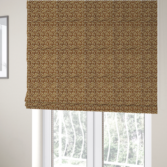 The fabric used to create these Roman blinds is a brown and cream textile fabric featuring a repeating, interlocking geometric pattern. The design consists of cream-colored outlines forming three-dimensional, isometric maze-like structures against a warm, dark brown background. Lightly distressed, tan-speckled textures are subtly scattered throughout the brown spaces, adding a weathered, organic feel to the structured, geometric design.