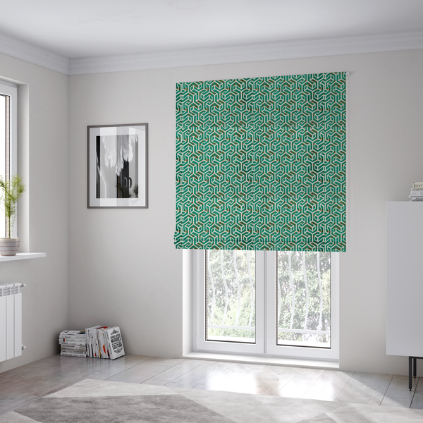The fabric used to create these Roman blinds is a teal and off-white textile fabric featuring a repeating, interlocking geometric pattern. The design consists of off-white outlines forming three-dimensional, isometric maze-like structures against a deep teal background. Distressed, brown speckled textures are subtly scattered throughout the teal spaces, giving the structured, geometric layout a weathered, organic touch.