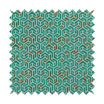 A teal and off-white textile fabric featuring a small-scale, densely repeating interlocking geometric pattern. Fine off-white outlines construct complex, three-dimensional isometric block formations against a deep teal background. Distressed, brown-speckled textures are integrated throughout, creating a weathered, organic contrast to the sharp geometric structure.