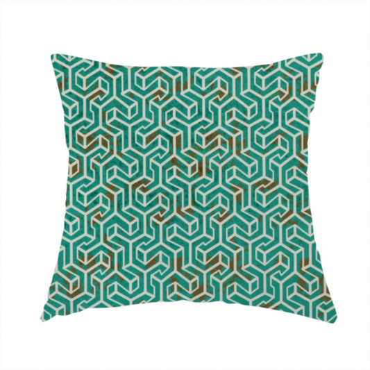 The fabric used to create this handmade cushion is a teal and off-white textile fabric featuring a small-scale, densely repeating interlocking geometric pattern. Fine off-white outlines construct complex, three-dimensional isometric block formations against a deep teal background. Distressed, brown-speckled textures are integrated throughout, creating a weathered, organic contrast to the sharp geometric structure.