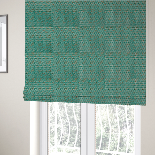 The fabric used to create these Roman blinds is a teal and off-white textile fabric featuring a small-scale, densely repeating interlocking geometric pattern. Fine off-white outlines construct complex, three-dimensional isometric block formations against a deep teal background. Distressed, brown-speckled textures are integrated throughout, creating a weathered, organic contrast to the sharp geometric structure.