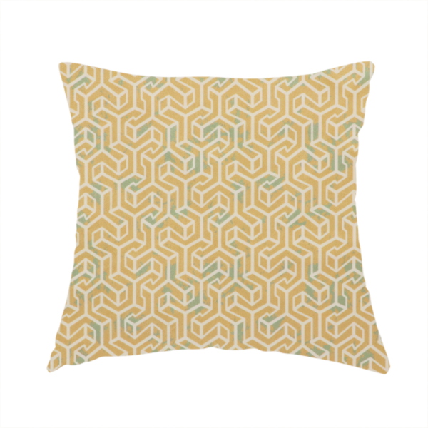 The fabric used to create this handmade cushion is a beige and off-white textile fabric featuring a small-scale, densely repeating interlocking geometric pattern. Fine off-white outlines construct complex, three-dimensional isometric block formations against a warm beige background. Distressed, pale green-blue speckled textures are integrated throughout, creating a weathered, organic contrast to the sharp geometric structure.