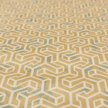A beige and off-white textile fabric featuring a small-scale, densely repeating interlocking geometric pattern. Fine off-white outlines construct complex, three-dimensional isometric block formations against a warm beige background. Distressed, pale green-blue speckled textures are integrated throughout, creating a weathered, organic contrast to the sharp geometric structure.