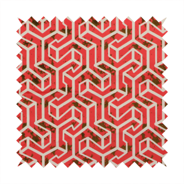 A red and off-white textile fabric featuring a repeating, interlocking geometric pattern. The design consists of off-white outlines forming three-dimensional, isometric maze-like structures against a vibrant coral red background. Distressed, dark brown speckled textures are subtly scattered throughout the red spaces, adding a weathered, organic touch to the structured, geometric design.