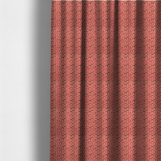 The fabric used to create these made-to-measure curtains is a red and off-white textile fabric featuring a repeating, interlocking geometric pattern. The design consists of off-white outlines forming three-dimensional, isometric maze-like structures against a vibrant coral red background. Distressed, dark brown speckled textures are subtly scattered throughout the red spaces, adding a weathered, organic touch to the structured, geometric design.