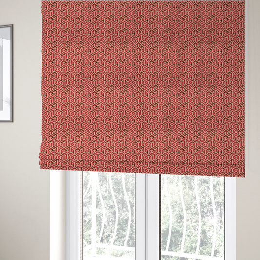 The fabric used to create these Roman blinds is a red and off-white textile fabric featuring a repeating, interlocking geometric pattern. The design consists of off-white outlines forming three-dimensional, isometric maze-like structures against a vibrant coral red background. Distressed, dark brown speckled textures are subtly scattered throughout the red spaces, adding a weathered, organic touch to the structured, geometric design.