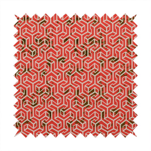 A coral red and off-white textile fabric featuring a small-scale, densely repeating interlocking geometric pattern. Fine off-white outlines construct complex, three-dimensional isometric block formations against a vibrant coral red background. Distressed, dark brown speckled textures are integrated throughout, creating a weathered, organic contrast to the sharp geometric structure.