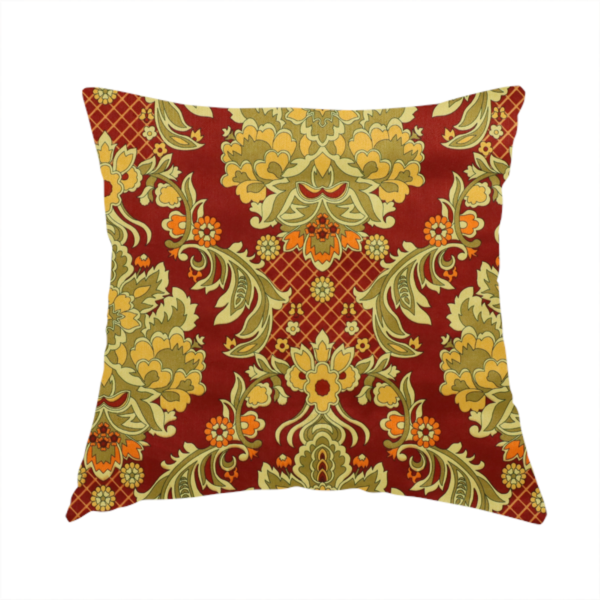 The fabric used to create this handmade cushion is a ornate damask fabric featuring large, symmetrical floral medallions in shades of sage green, golden ochre, and muted orange.