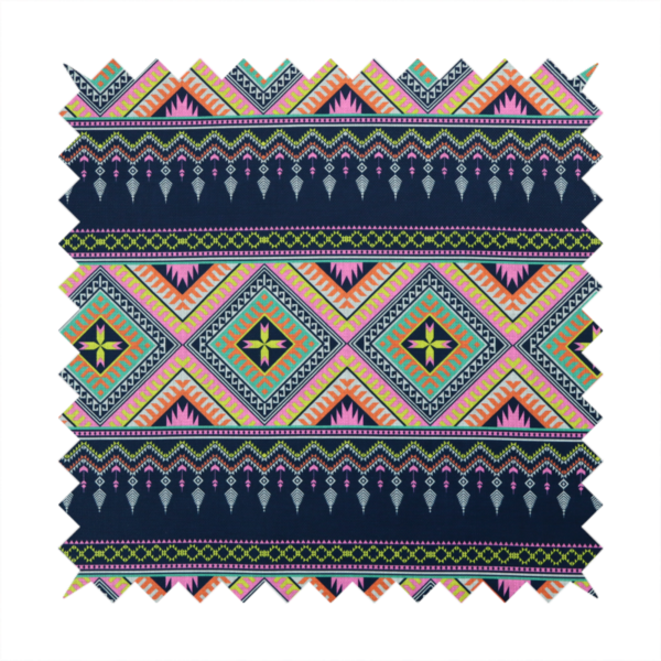 A vibrant, repeating geometric Aztec or tribal fabric pattern organized in horizontal bands. The design features alternating wide stripes of colourful diamond and zigzag motifs against narrower dark navy bands filled with intricate chevron and tassel-like embroidery accents.