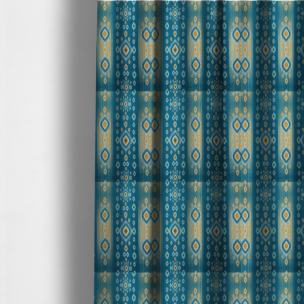 The fabric used to create these made-to-measure curtains is a seamless, vertically striped ikat fabric pattern with traditional blurred or feathered edges set against a rich teal backdrop.