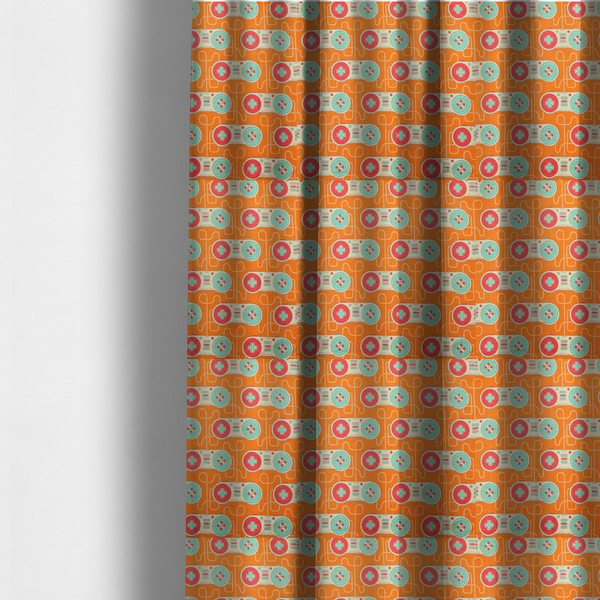 The fabric used to create these made-to-measure curtains is a playful, retro-inspired repeating fabric pattern featuring classic video game controllers connected by winding cord lines set against a warm orange background.