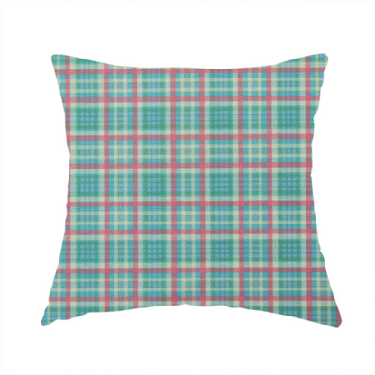 The fabric used to create this handmade cushion is a fabric features a woven plaid pattern consisting of intersecting horizontal and vertical stripes in shades of teal, soft pink, light blue, and cream. The pattern creates a series of repeated squares and rectangles across the surface.