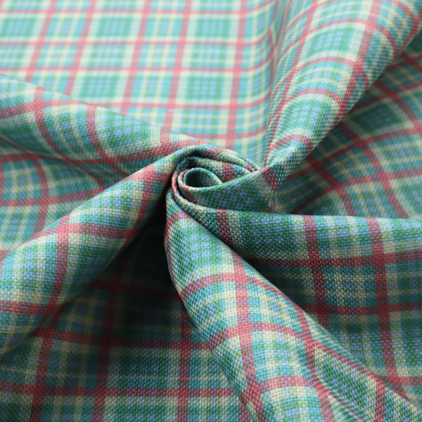 This fabric features a woven plaid pattern consisting of intersecting horizontal and vertical stripes in shades of teal, soft pink, light blue, and cream. The pattern creates a series of repeated squares and rectangles across the surface.