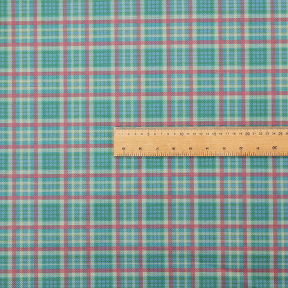 This fabric features a woven plaid pattern consisting of intersecting horizontal and vertical stripes in shades of teal, soft pink, light blue, and cream. The pattern creates a series of repeated squares and rectangles across the surface.