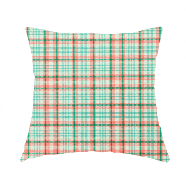 The fabric used to create this handmade cushion is a fabric features a woven plaid pattern with a grid of intersecting horizontal and vertical stripes in coral, aqua, and dark green over a cream-colored background.