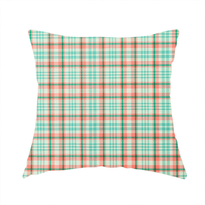 The fabric used to create this handmade cushion is a fabric features a woven plaid pattern with a grid of intersecting horizontal and vertical stripes in coral, aqua, and dark green over a cream-colored background.