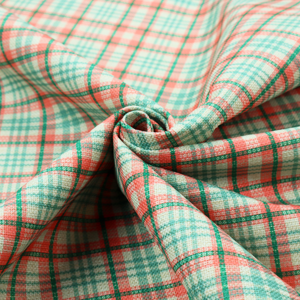 This fabric features a woven plaid pattern with a grid of intersecting horizontal and vertical stripes in coral, aqua, and dark green over a cream-colored background.