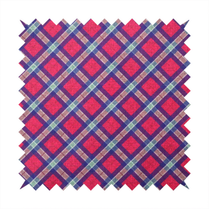 This fabric features a diagonal plaid pattern, creating a diamond-shaped grid. The design is composed of bold magenta squares framed by dark blue and thin white intersecting lines.