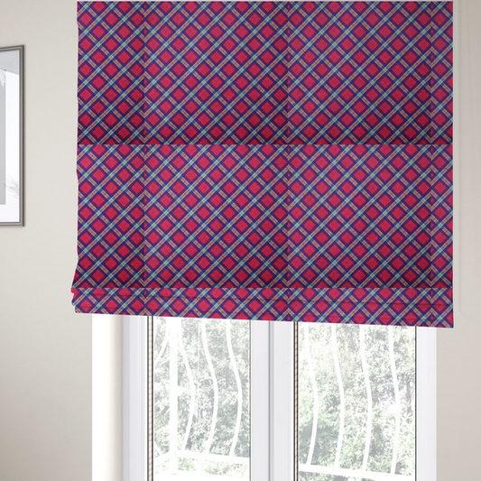 The fabric used to create these Roman blinds is a fabric features a diagonal plaid pattern, creating a diamond-shaped grid. The design is composed of bold magenta squares framed by dark blue and thin white intersecting lines.